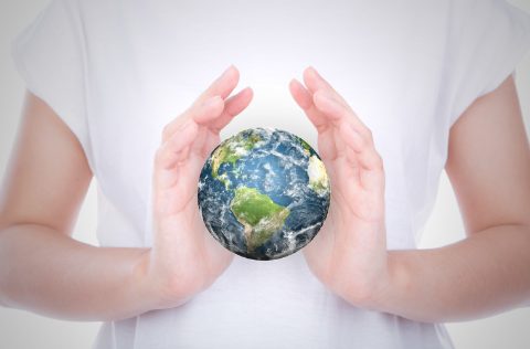 Cambio Climático, tierra manos