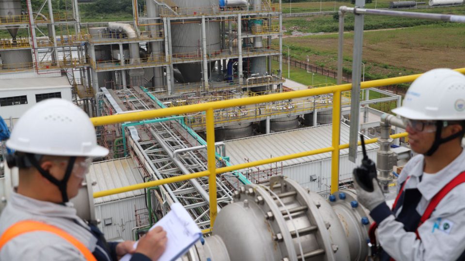 Calysseo, operarios en fábrica de China
